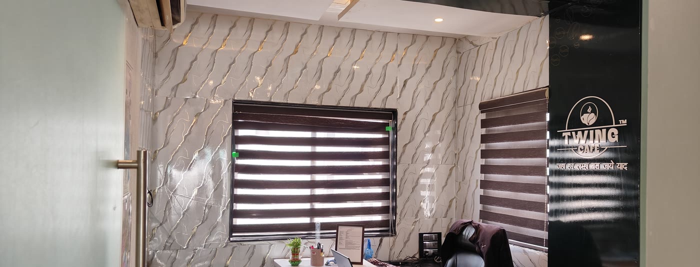 Twing Cafe branded pillar and workstation at corporate office